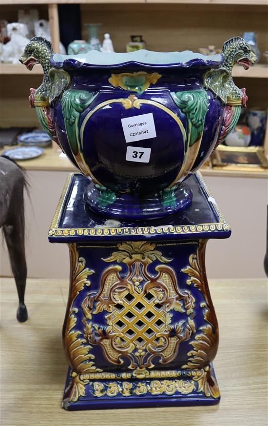 A maiolica jardiniere and associated stand height 62cm